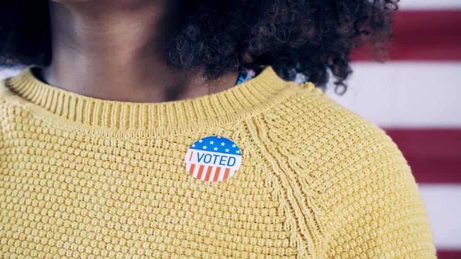 Photo: Woman with I Voted sticker