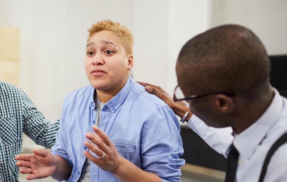 Photo: Woman upset during a dialogue