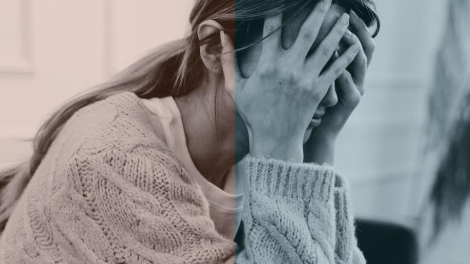 Photo: woman holding head in hands