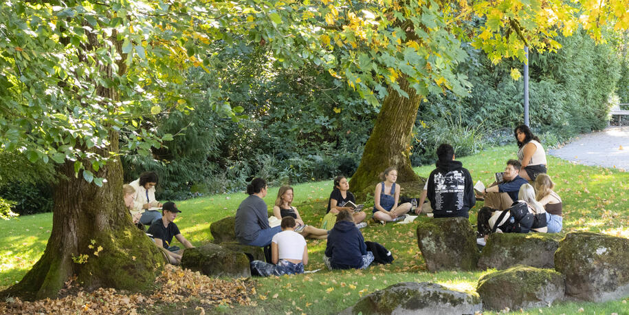 Photo: Group of Lewis and Clark students engaged in dialogue outside, Courtesy of Lewis & Clark